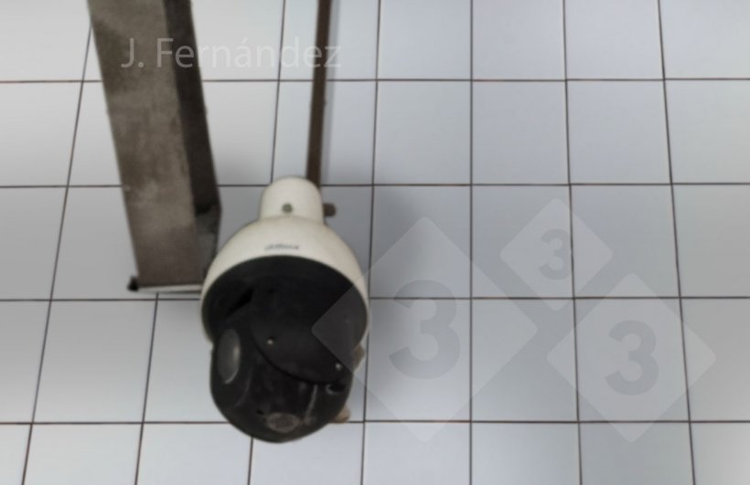 A camera that is part of the video surveillance system installed in a slaughterhouse.